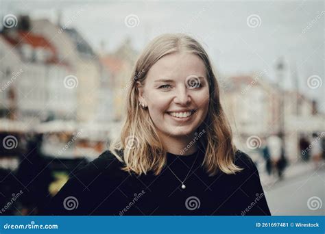 Beautiful Blonde Caucasian Woman Portrait Smiling At The Camera In Copenhagen Denmark Stock