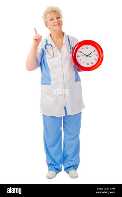 Mature doctor with clock isolated Stock Photo - Alamy