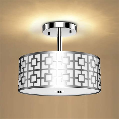 A Ceiling Light With An Intricate Design On It