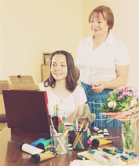 Mature Teacher Gives Advice Pupil Stock Photo Image Of Home Mature