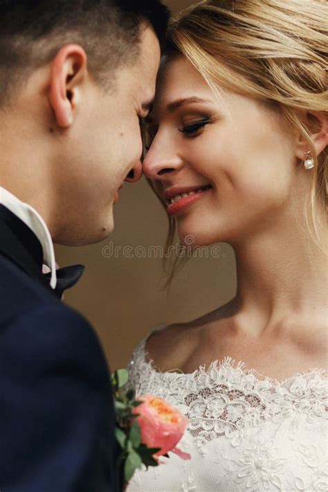 Sensual Happy Couple Posing And Hugging Near Old Castle Stock Image