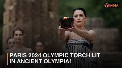 Paris 2024 Olympic Torch Lit In Ancient Olympia Final Countdown To