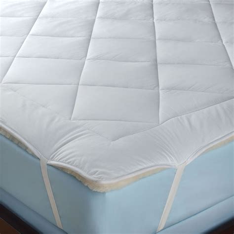 The All Season Reversible Cotton Wool Mattress Pad Hammacher Schlemmer