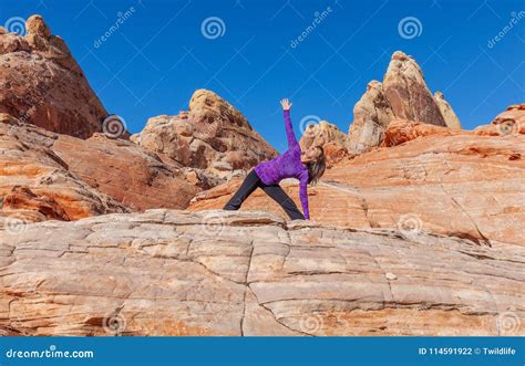 Woman Practicing Yoga In Red Rocks Stock Photo Image Of Reflection