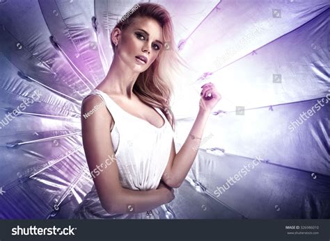 Стоковая фотография Beautiful Sexy Blonde Woman Posing On Shutterstock