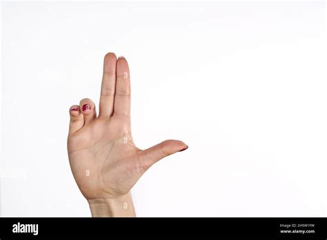 Womans Hand Making Shooting Gun Gesture Hand Pistol Gesture On