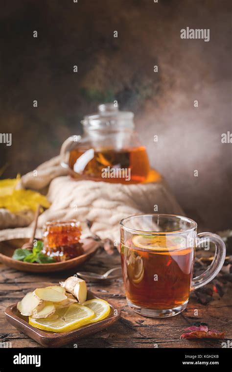 Glass Cup Of Hot Tea With Mint Honey Ginger And Lemon On Dark Background Stock Photo Alamy