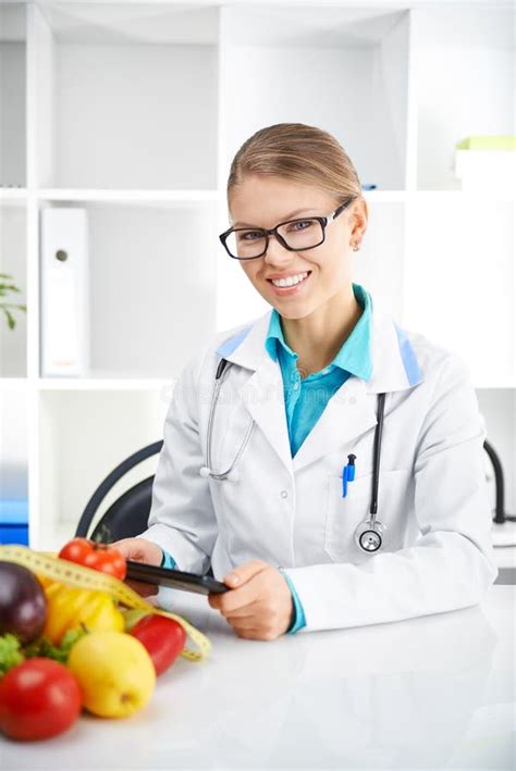 female dietitian stock photo image  obesity desk