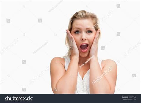 Surprised Blonde Woman Putting Her Hands Stock Photo 111277748 Shutterstock