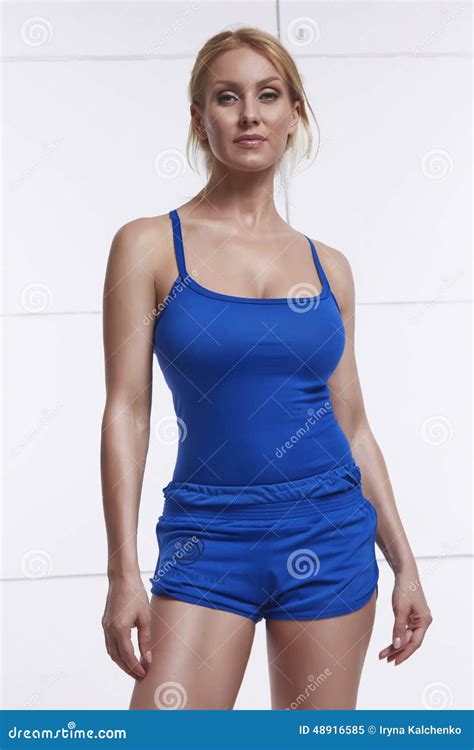 Beautiful Blonde With Perfect Athletic Slim Figure Engaged In Yoga