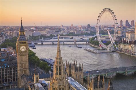 London skyline with Big Ben and London Eye - Austin Woman Magazine