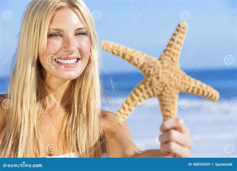Beautiful Woman Girl In Bikini With Starfish At Beach Stock Image