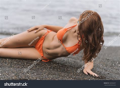 Beautiful Woman Orange Bikini On Beach Stock Photo 502546291 Shutterstock