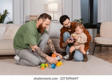 Same Sex Parents Holding Toys Near Stock Photo Shutterstock