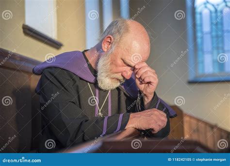 Mature Priest Looking Worried Praying In A Church Stock Image Image Of Minister Looking