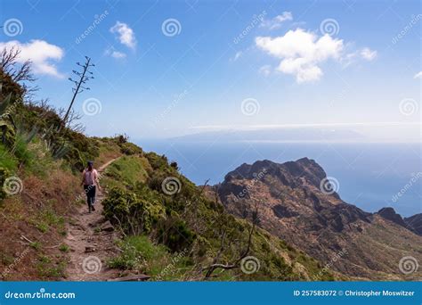 Pico Verde Rear View On Backpacking Woman On Coastal Scenic Hiking