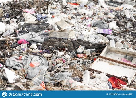 A Large Pile of Various Rubbish Scattered on the Ground. Environmental ...