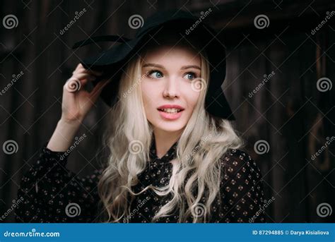 Beautiful Attractive And Stylish Girl Wearing Black Hat Standing Posing In City Nude Makeup