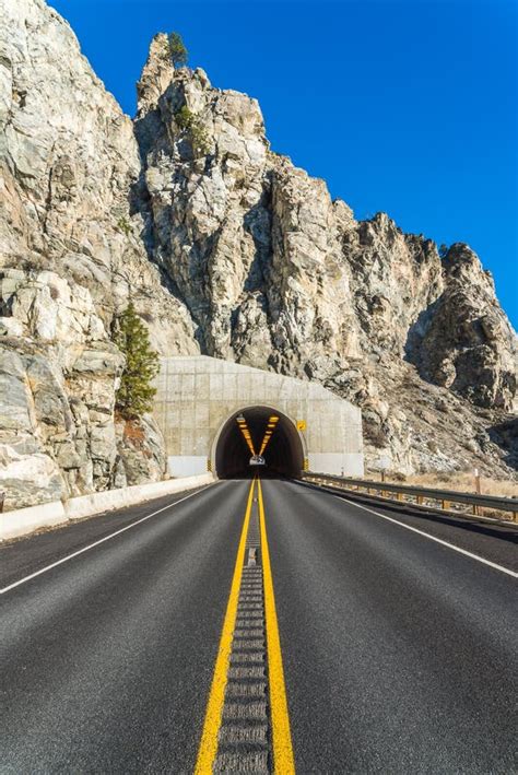 Scene Of Road Tunnel Mountain Tunnel On Sunny Day With Blue Sky