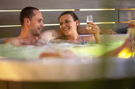 Premium Photo Couple Bathing In Hot Tub