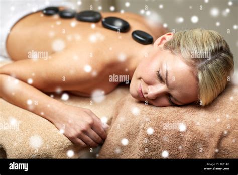 Close Up Of Woman Having Hot Stone Massage In Spa Stock Photo Alamy