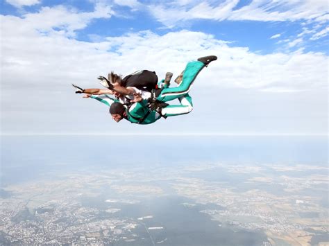 Skydiver survives getting tangled under plane in Denmark | The