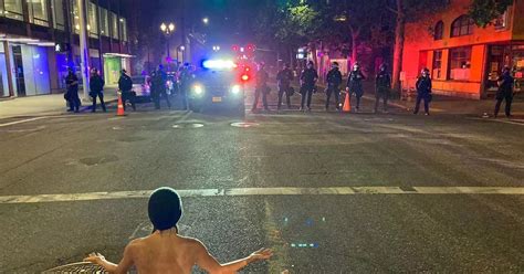 Bizarre Moment Naked Protester Doing Yoga In Street Forces Riot Police