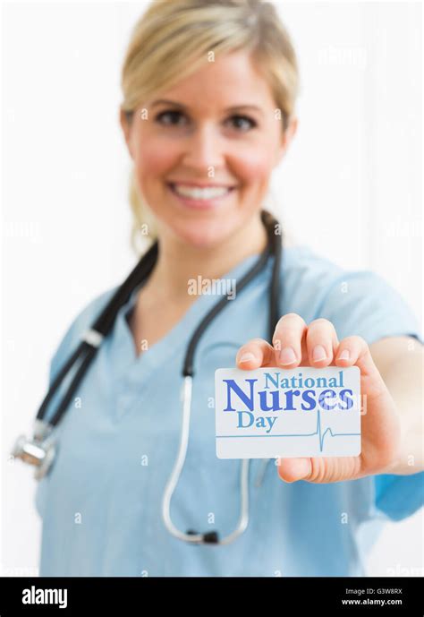 Blonde Nurse Smiling Holding Stethoscope Hi Res Stock Photography And