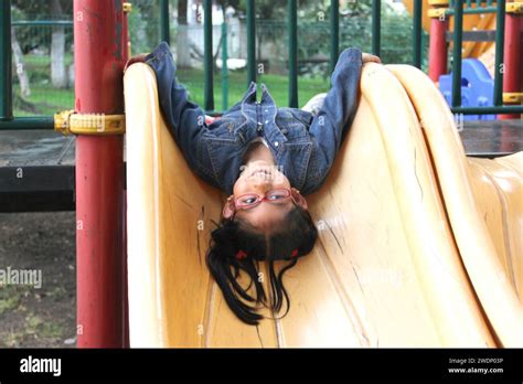 Year Old Latin Brunette Girl Plays In A Playground Does Physical Activity As ADHD Therapy