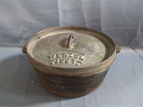 Wenzel 1887 Cast Iron Cookware Set In Wood Crate Mayo Auction And Realty