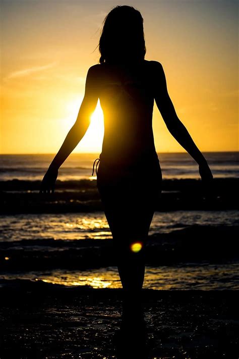 silhouette plage Soleil le coucher du soleil été mer Jeune fille