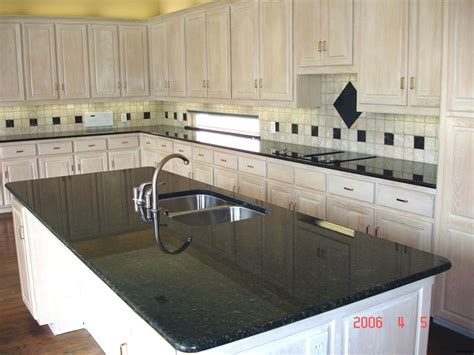 White Cabinets Ubatuba Granite Kitchen Countertops