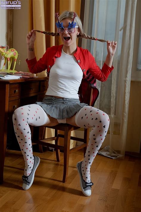 Pigtailed Blonde In White Stockings Showing Off Her Pussy On Cam IamXXX