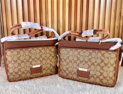District Crossbody In Signature Canvas Luxury Bags And Wallets On Carousell