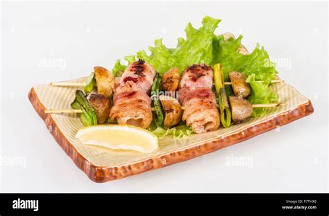 Bacon Wrapped Grilled Scallops With Mushrooms And Bacon Stock Photo Alamy