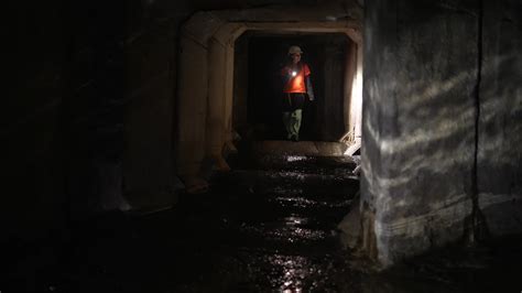 Explorers going in the underground water caves 13165717 Stock Video at