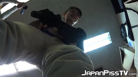 Japanese Babe Pisses While Wearing Her Pants