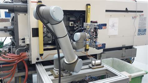 Ur Robots Speed Up In Mold Labelling Process