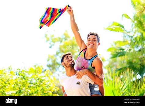 Happy Gay Couple Spending Time Together In Sunny Day In Green Park Stock Photo Alamy