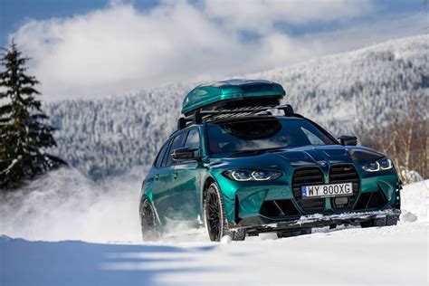 Bmw M3 Touring With Matching Roof Box Poses In A Winter Wonderland