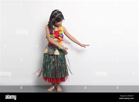 Year Old Latina Brunette Girl With Glasses And Hawaiian Skirt Enjoys