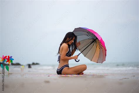 Sexy Beautiful Asian Woman On Beach Summer Vacation In Bikini Sitting On Sand In Holiday Stock
