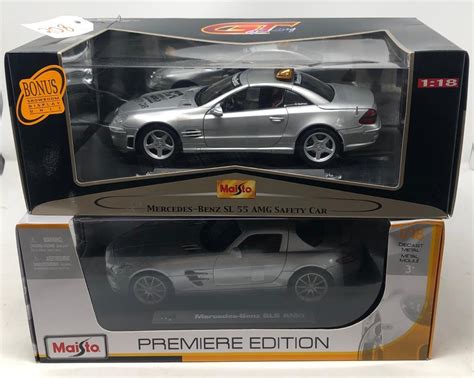 Two 118 Scale Maisto Diecast Metal Model Cars In Original Boxes Including A Mercedes Benz Sls