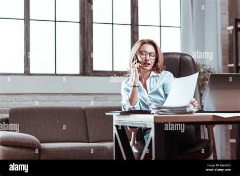 Blonde Haired Businesswoman Calling Her Secretary Giving Instructions Stock Photo Alamy