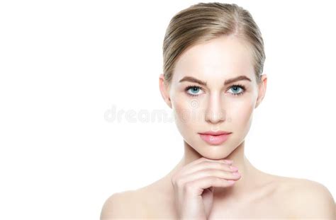 Pretty Girl With Blue Eyes And Blond Hair With Naked Shoulders Looking At Camera Smiling