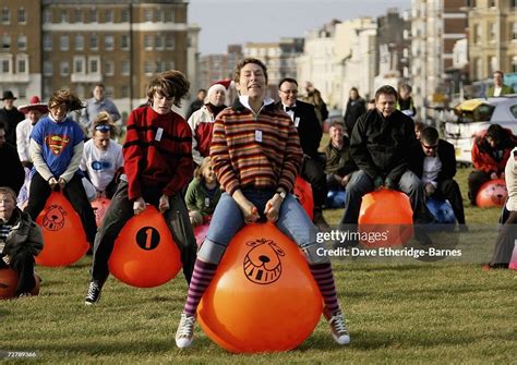 Contestants Race On Space Hoppers During The Bounce Your Balls For