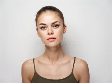 Portrait Of A Woman T Shirt On A Light Background Hairstyle Model Naked Shoulders Stock Image