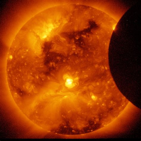 solar eclipse beginning nasa hinode  editors flickr