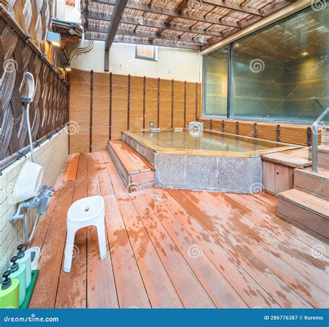 Classic Open Air Japanese Hot Spring Onsen Rotenburo Having Walls Adorned With Reeds Stock