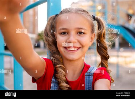 Blonde Girl Stretching Out Her Hands Camera Stock Photo Alamy